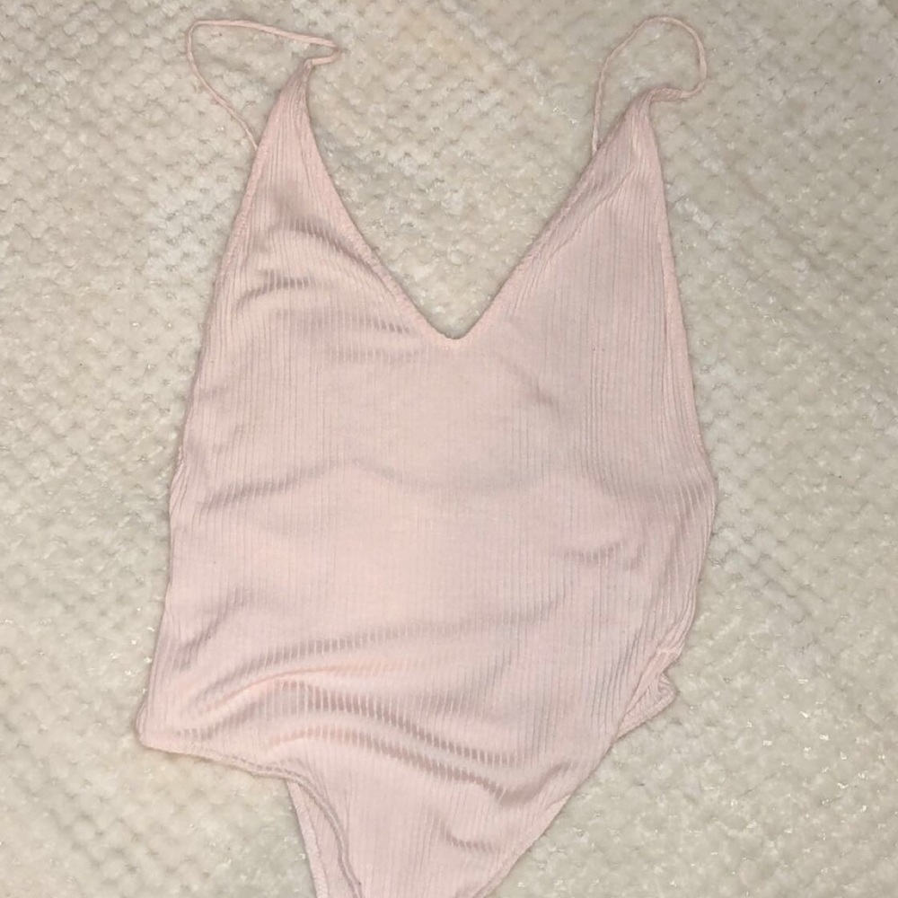 Pink deep v bodysuit.